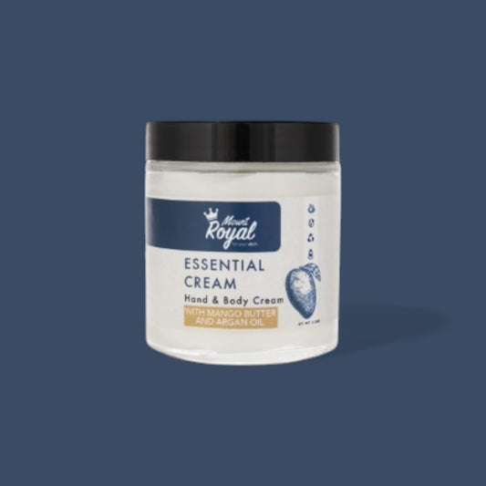 A jar of Essential Cream with natural botanical ingredients, showcasing its hydrating and soothing properties.