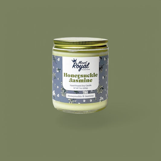 Honeysuckle Jasmine Candle in a minimalist jar, hand-poured with eco-friendly soy wax and a soft floral scent.