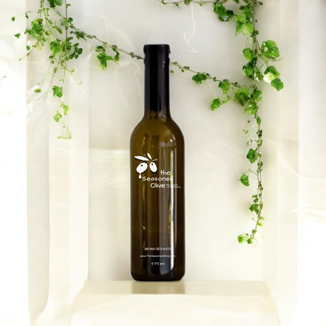 "Premium White Wine Vinegar bottle from Modena, Italy by VR Aceti, with a light and crisp flavor perfect for vinaigrettes, French sauces, and deglazing sauté pans."